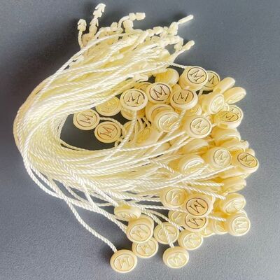 Wipe With A Soft Cloth Plastic Tag Fastener Garment Tagging Custom Rope Length Strong Durable Label Attachment Solution
